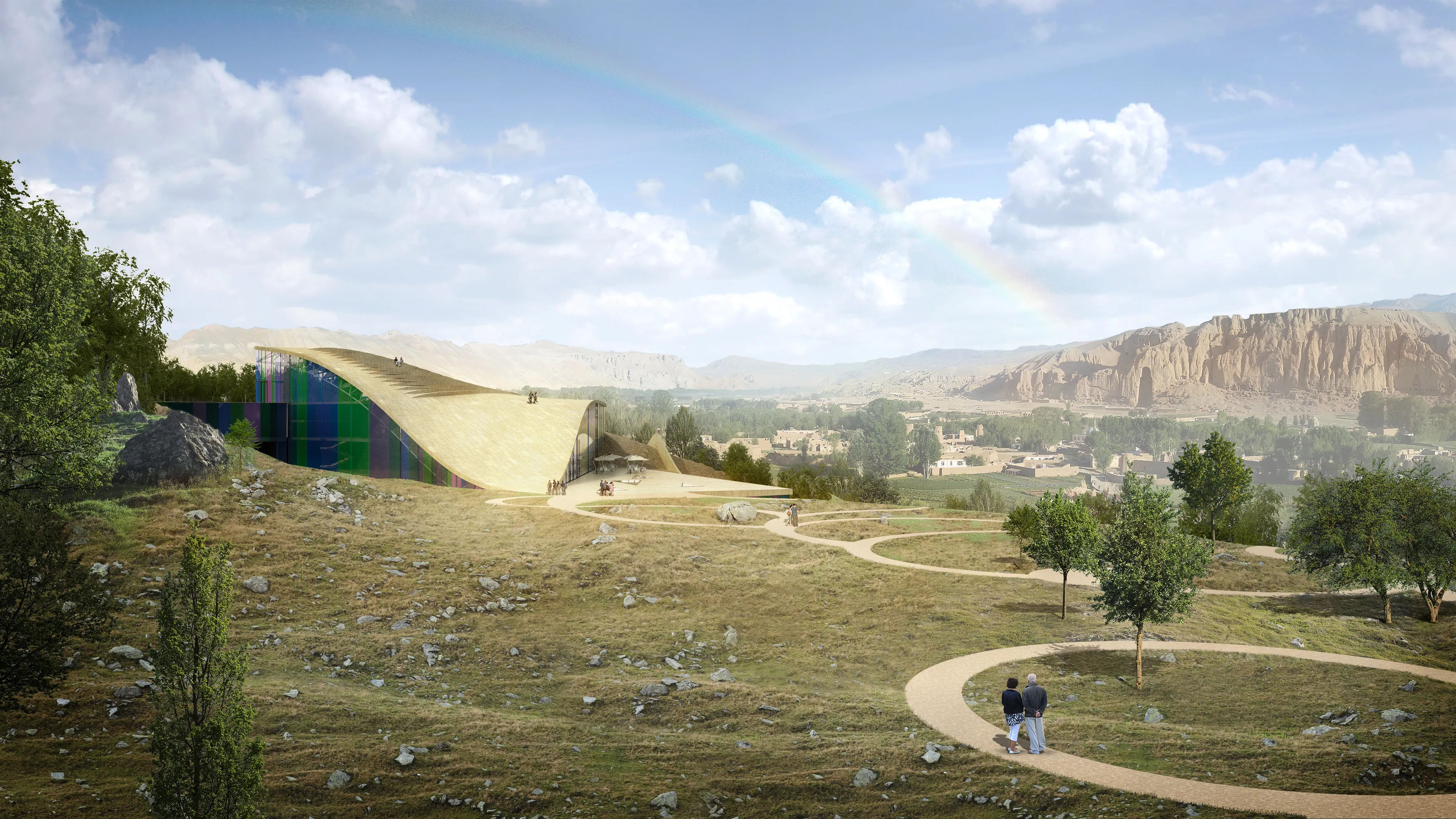 Prismatic cultural centre embedded in a rocky hillside.